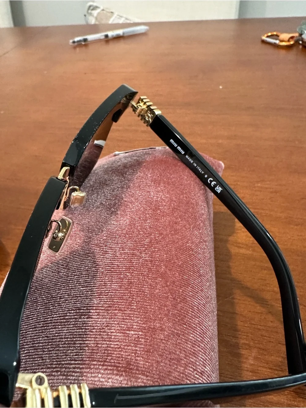 Miu Miu Black Sunglasses with Pink Case